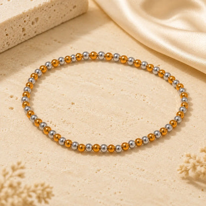 Bracelet extensible doré perlé en PVD Norelle™ pour femme