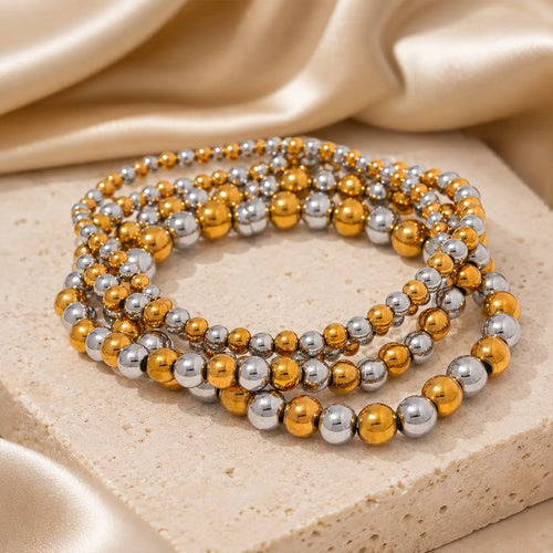 Bracelet extensible doré perlé en PVD Norelle™ pour femme