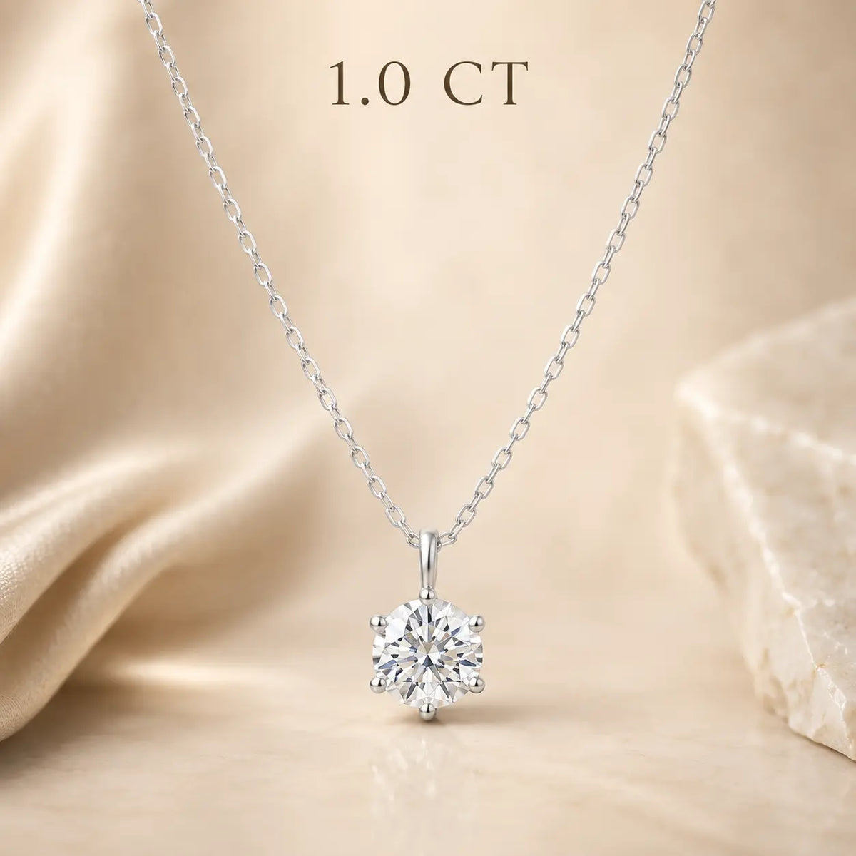 1 carat round moissanite pendant necklace with a classic solitaire design
