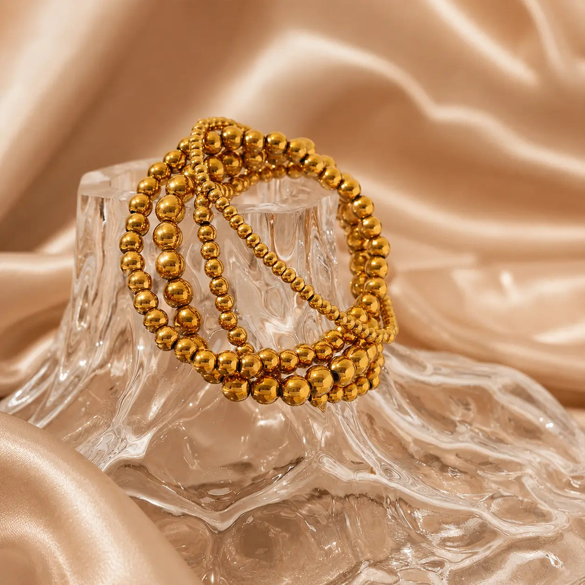 Bracelet extensible doré perlé en PVD Norelle™ pour femme