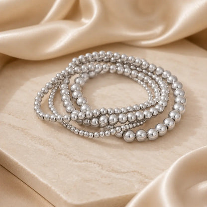 Bracelet extensible doré perlé en PVD Norelle™ pour femme