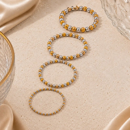 Bracelet extensible doré perlé en PVD Norelle™ pour femme