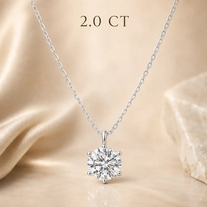2 carat round solitaire moissanite pendant necklace on a fine silver tone chain