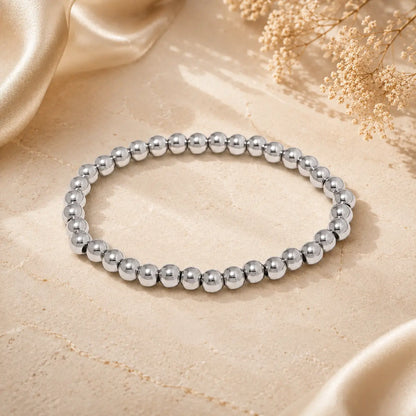 Bracelet extensible doré perlé en PVD Norelle™ pour femme