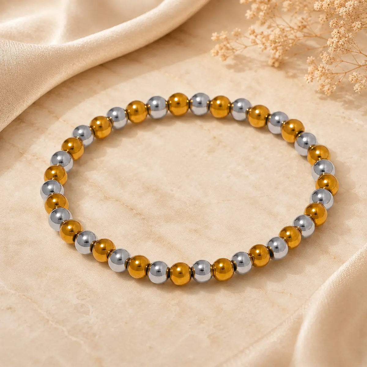 Bracelet extensible doré perlé en PVD Norelle™ pour femme