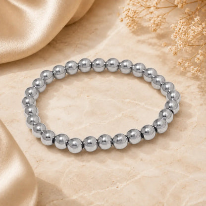 Bracelet extensible doré perlé en PVD Norelle™ pour femme
