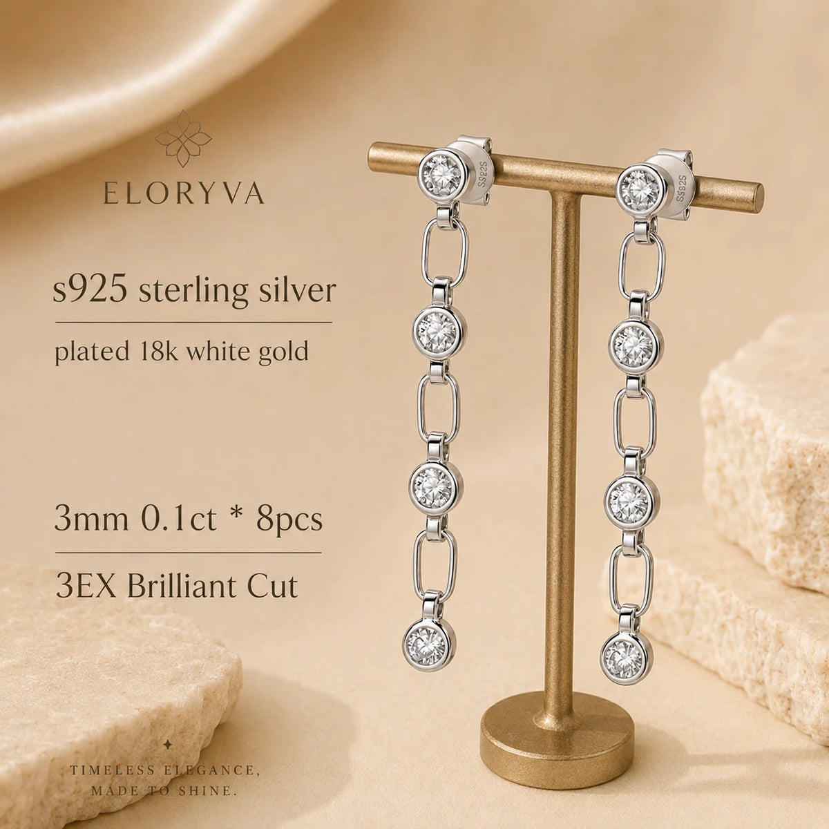 Liora 925 sterling silver linear drop earrings with white gold plating and eight 3 mm brilliant-cut stones.