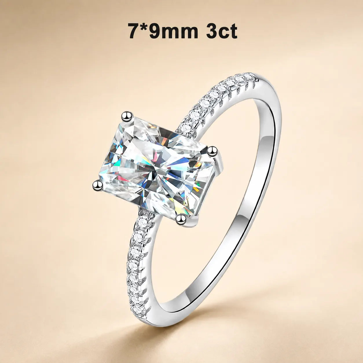 3 carat radiant-cut moissanite engagement ring with a 7 x 9 mm center stone and polished pavé setting.