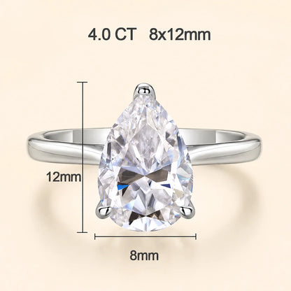 4 carat pear-cut moissanite engagement ring with an 8 x 12 mm center stone and polished silver band.