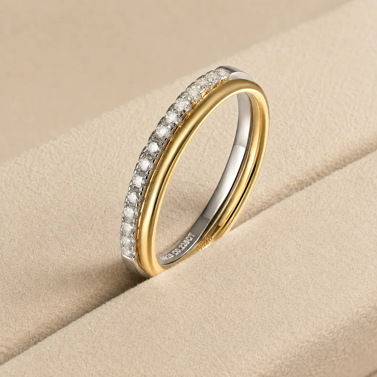 Bexley™ Moissanite Stacking Ring for Women in gold, shown in an angled close-up view with delicate sparkle.