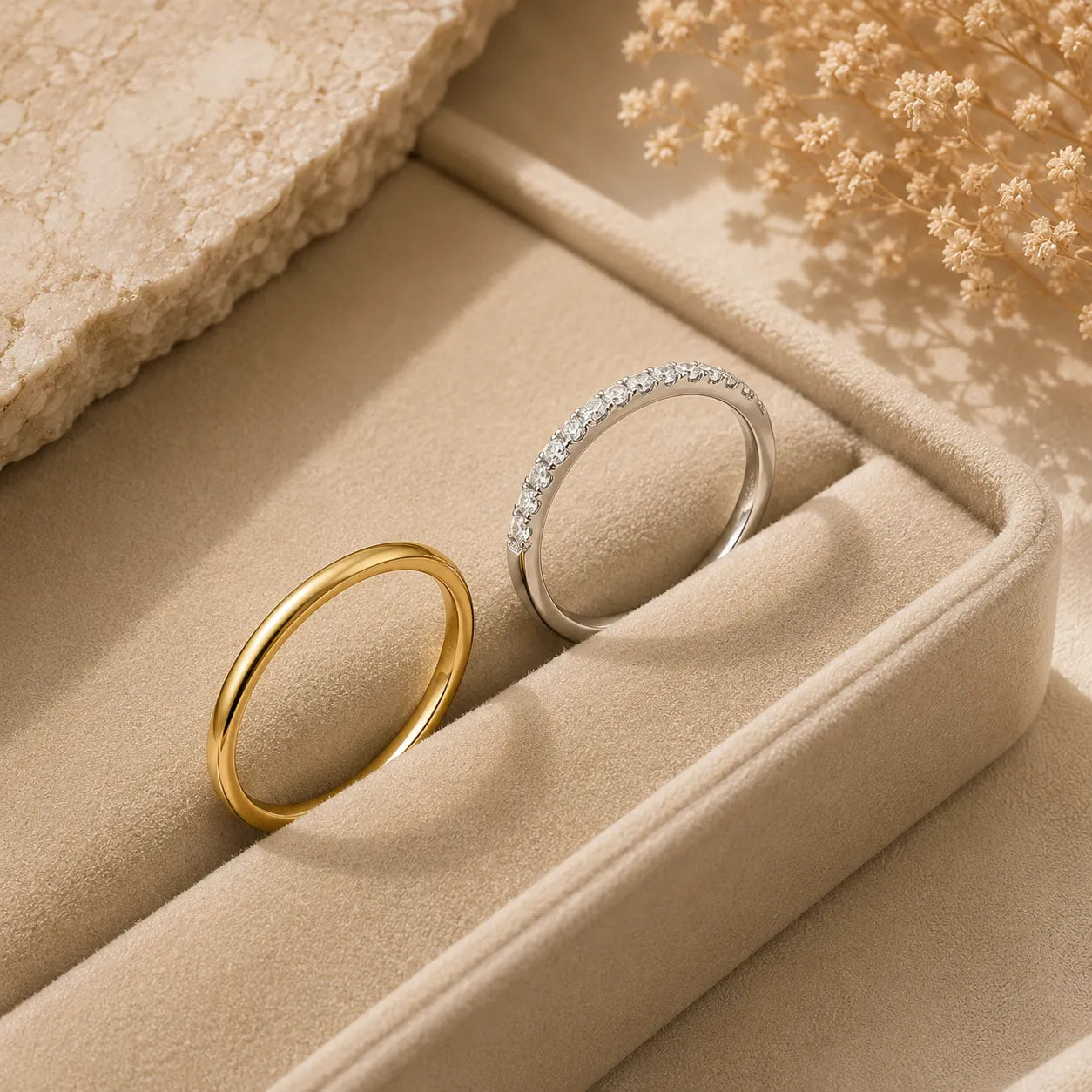 Bexley™ Moissanite Stacking Rings for Women displayed in gold and silver finishes inside a soft jewelry box.