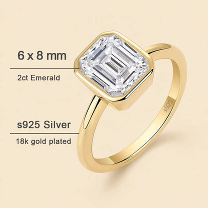Hadley™ 2CT Emerald-Cut Moissanite Engagement Ring with a 6 x 8 mm emerald-cut moissanite stone in S925 sterling silver with 18K gold-plated finish.