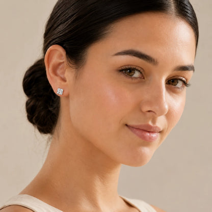Woman wearing princess-cut moissanite stud earrings for an elegant and refined everyday look.