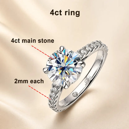 Sutton™ 4 carat round moissanite engagement ring with a 10 mm center stone and sparkling 2 mm pavé band.