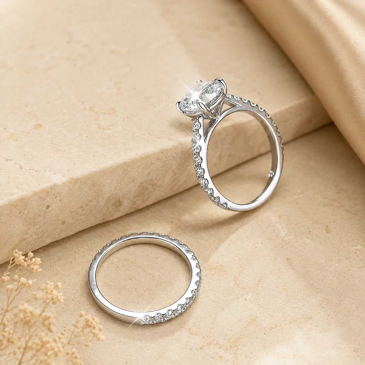Side view of the Sutton™ Round Moissanite Bridal Set showing the raised solitaire setting and matching pavé wedding band.