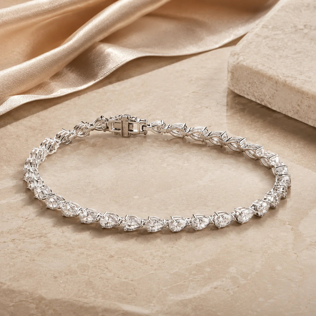 Back view of the Langley™ pear-cut moissanite tennis bracelet for women showing the open stone settings and clasp construction.