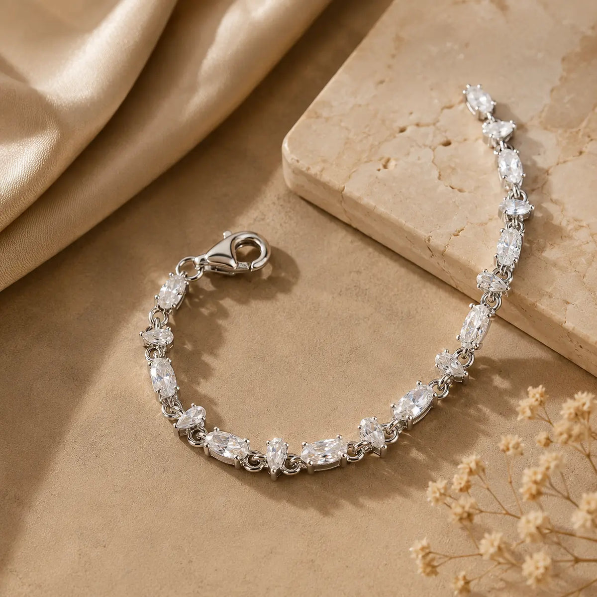 Mixed-cut moissanite tennis bracelet for women displayed open to show the stone arrangement and secure clasp.