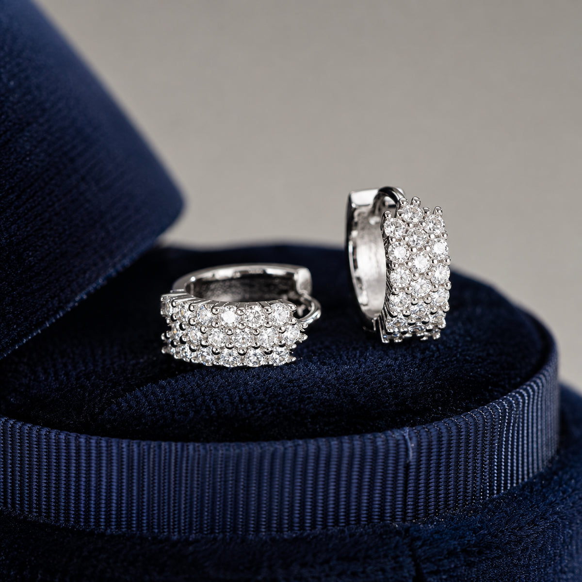 Moissanite hoop earrings displayed in a navy luxury gift box, ready for an elegant jewelry gift.