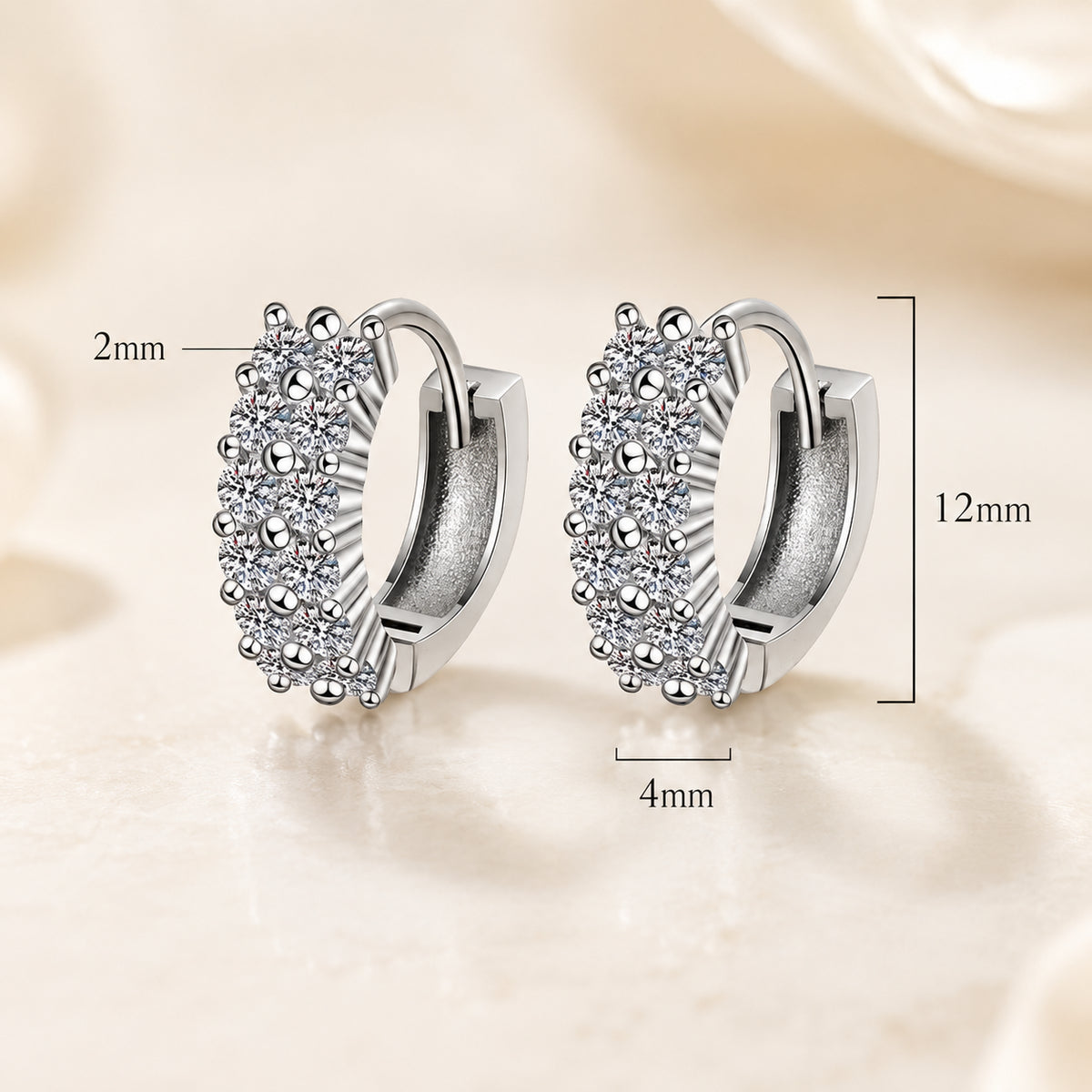925 sterling silver moissanite hoop earrings showing 12mm height, 4mm width, and 2mm thickness.