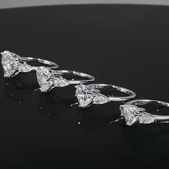Close-up video of an Eloryva silver ring featuring a heart-shaped center stone with two sparkling side stones.