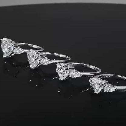 Close-up video of an Eloryva silver ring featuring a heart-shaped center stone with two sparkling side stones.