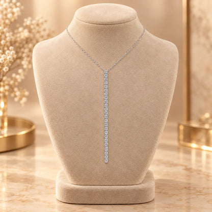 Silver tone moissanite Y necklace with a long vertical row of sparkling stones