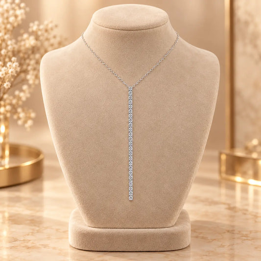 Silver tone moissanite Y necklace with a long vertical row of sparkling stones