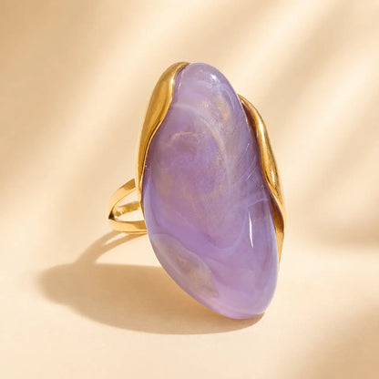 Purple Solenne™ Color Resin Statement Ring for Women with a glossy lilac finish and polished gold-tone accents.
