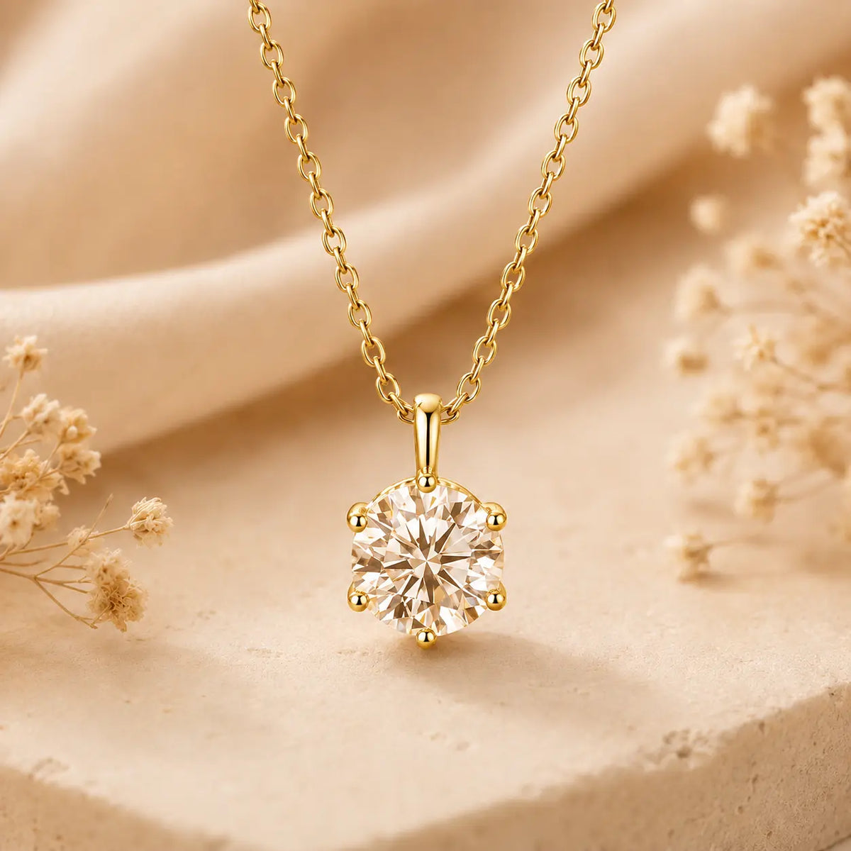 Yellow gold round moissanite pendant necklace styled in a warm beige setting